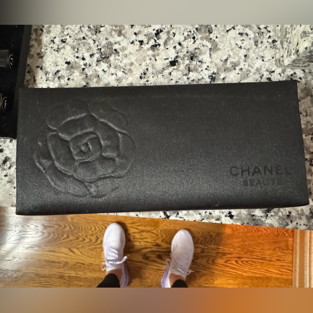 CHANEL Beauté Black Makeup Organizer with Embossed Floral Design